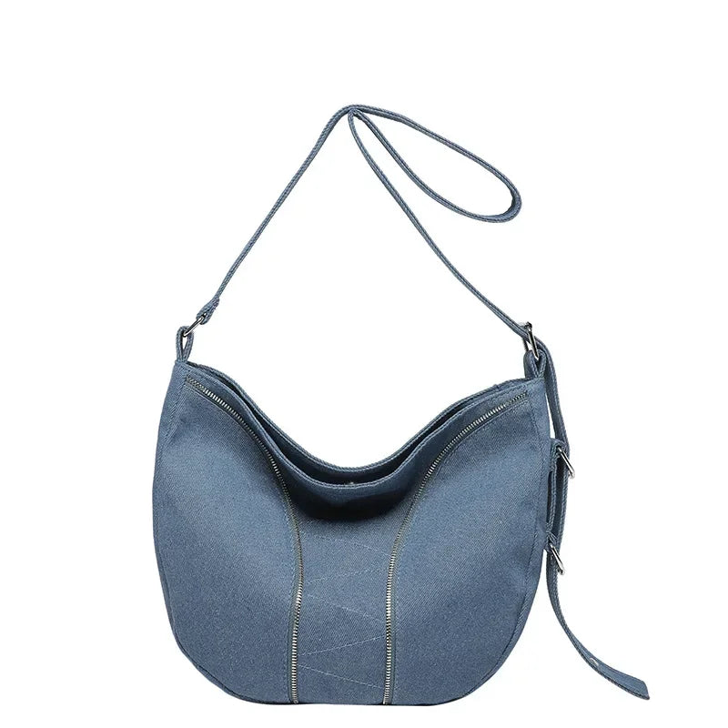 Soft washed denim shoulder bag with casual fold design