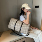 Textured leather travel duffle bag