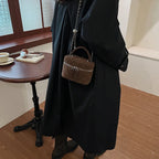 Classic suede handbag with structured handle