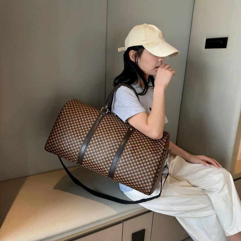 Textured leather travel duffle bag