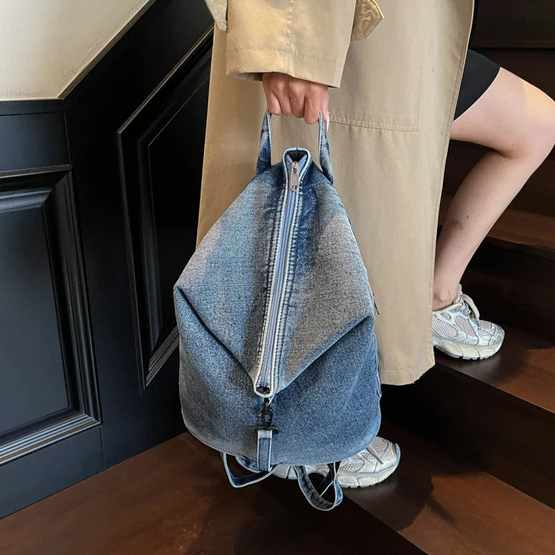 Washed denim backpack with adjustable straps