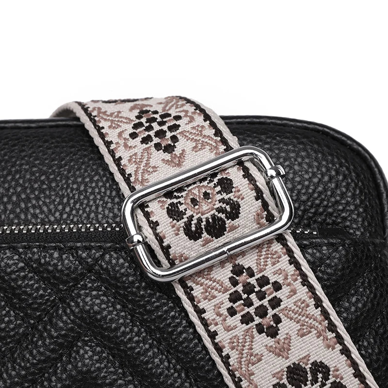 Textured leather crossbody bag