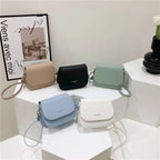 Compact leather sling crossbody