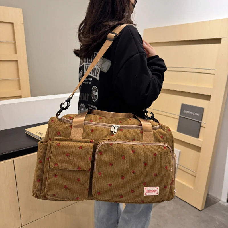 Corduroy travel toiletry bag with shoulder strap
