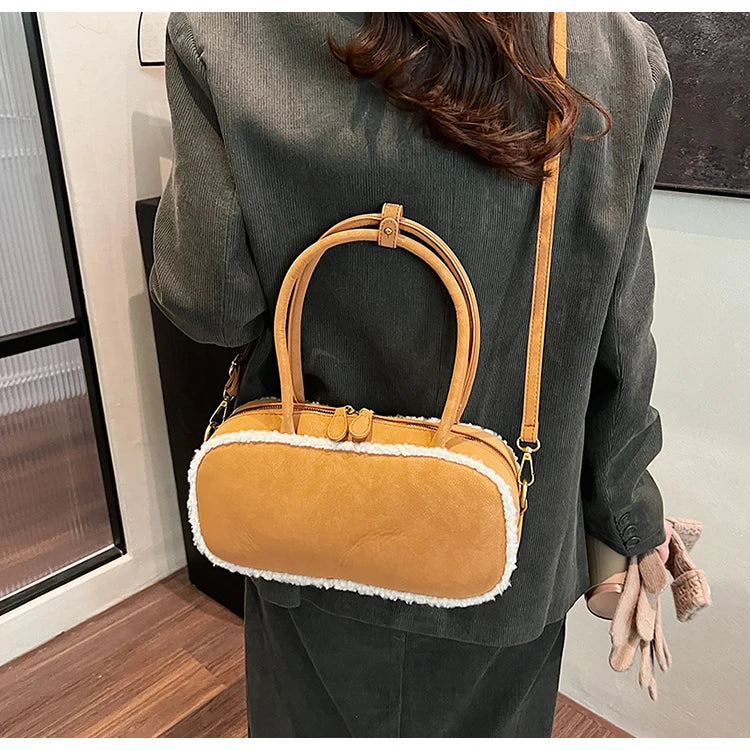 Elegant suede handbag with vintage charm