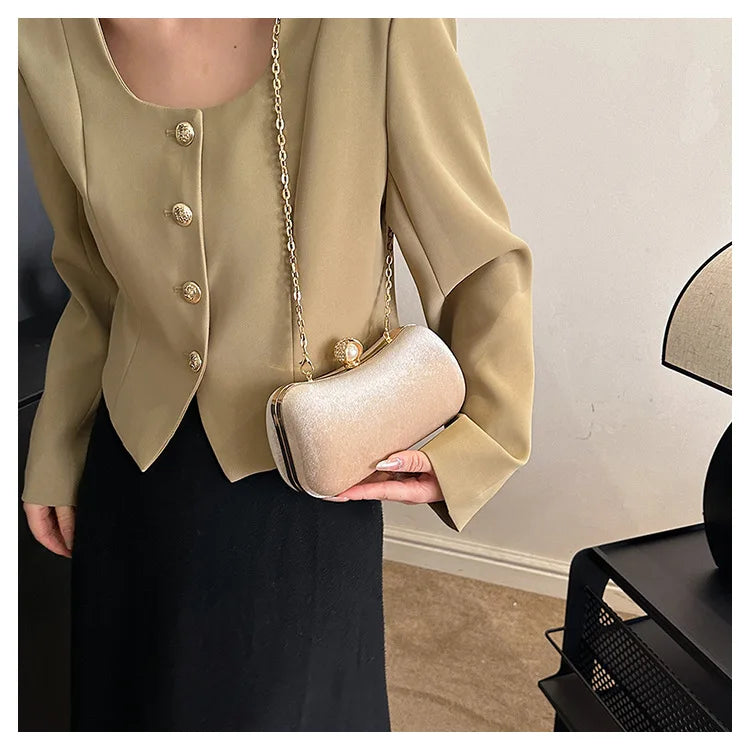 Corduroy clutch bag with  chain strap