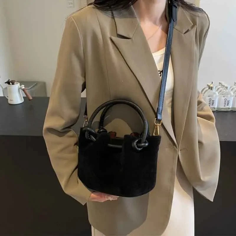 Everyday suede handbag with strap
