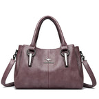 Leather handbag with detachable shoulder strap