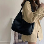 Women's black leather hobo bag