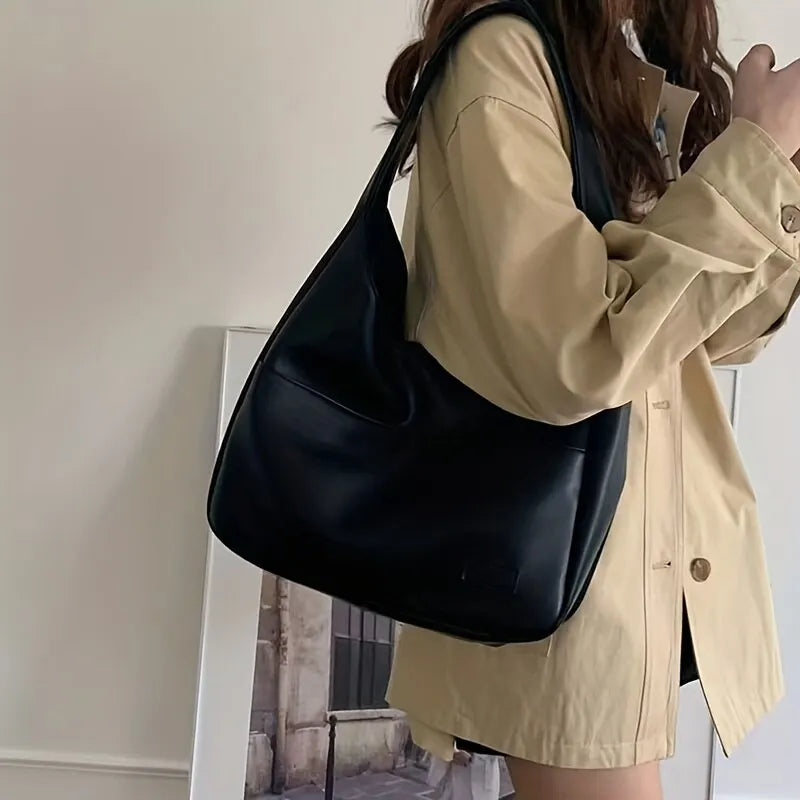 Women's black leather hobo bag