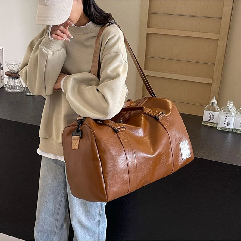 Slim leather duffle bag