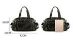 Rugged leather duffle bag with side pockets