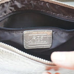 Textured leather clutch