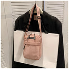 Compact corduroy crossbody bag
