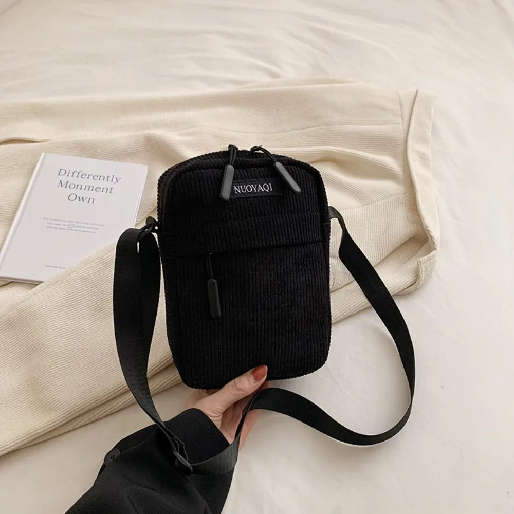 Compact corduroy crossbody bag