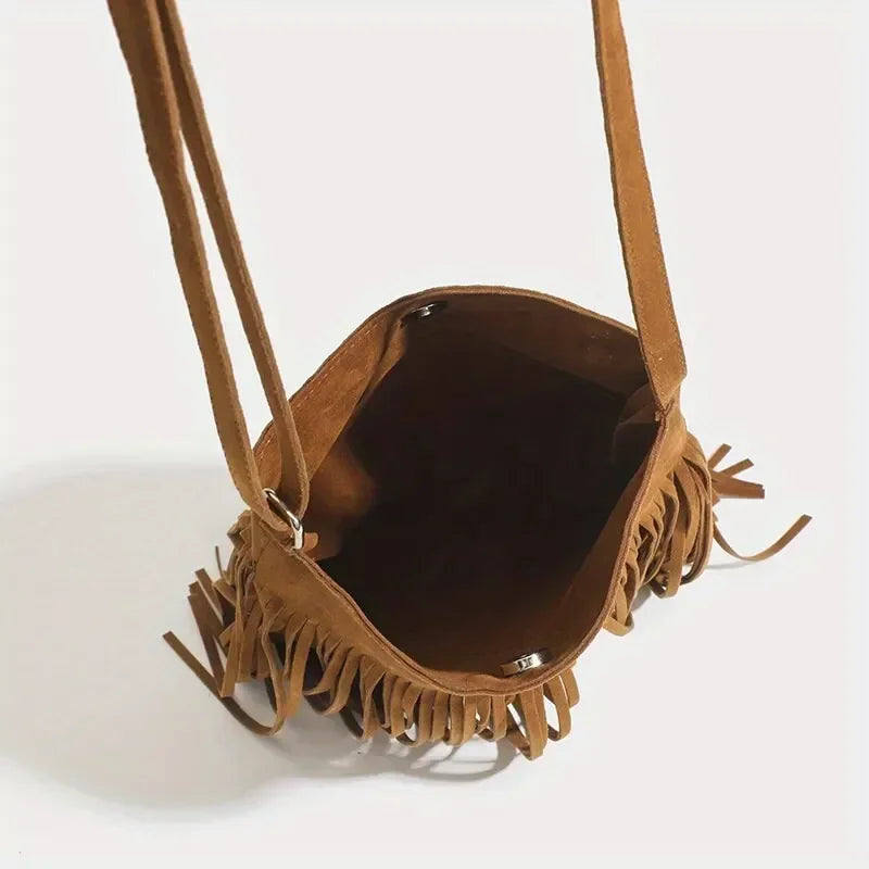 Classic suede shoulder bag with soft silhouette
