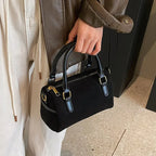 High-end suede purse with structured body