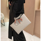 Crocodile texture leather clutch bag