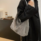 Versatile corduroy handbag with shoulder strap