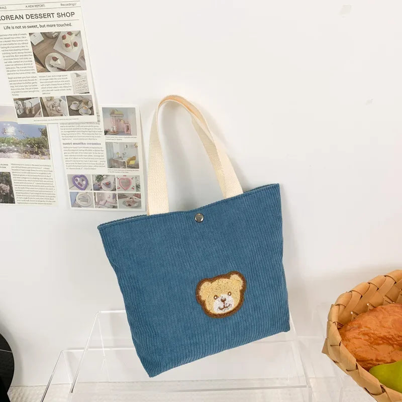 Women’s corduroy shoulder tote bag with front patch