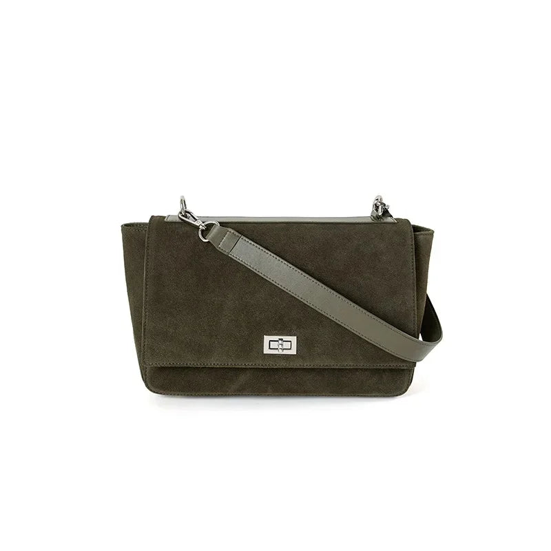 Textured suede handbag with flap closure