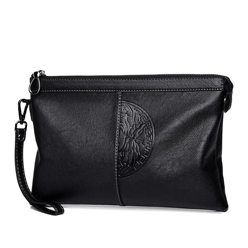 Minimalist leather clutch with detachable strap