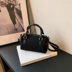 High-end suede purse with structured body