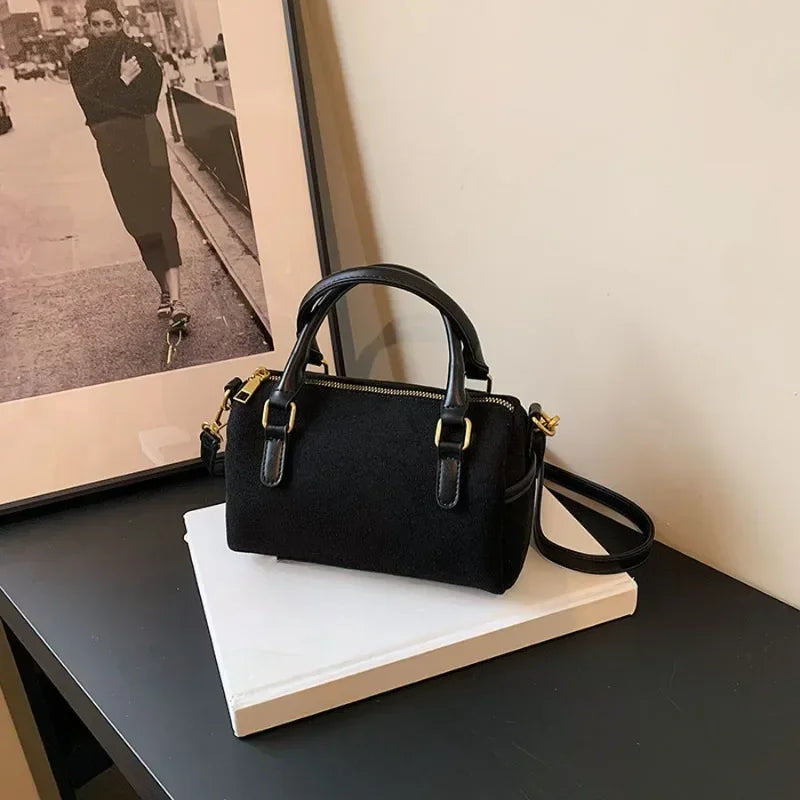 High-end suede purse with structured body