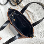 Two-tone suede purse with leather accents