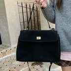 Structured modern suede handbag
