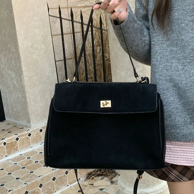Structured modern suede handbag