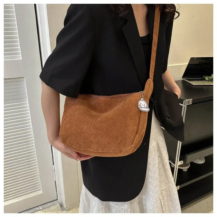 Corduroy handbag with adjustable shoulder strap