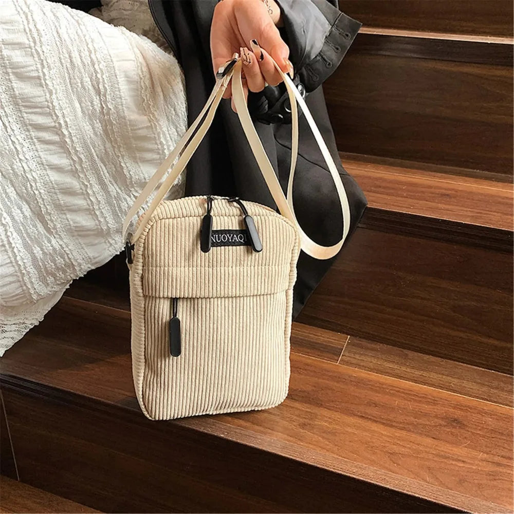 Compact corduroy crossbody bag