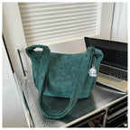 Corduroy handbag with adjustable shoulder strap