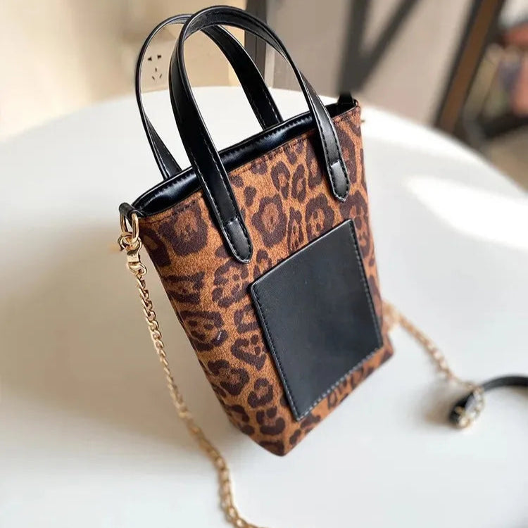 Two-tone suede purse with leather accents