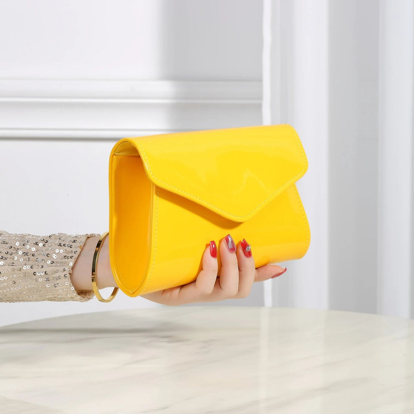 Minimal leather handbag with slim profile