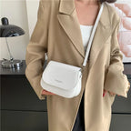 Compact leather sling crossbody