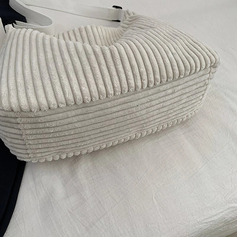 Versatile corduroy handbag with shoulder strap