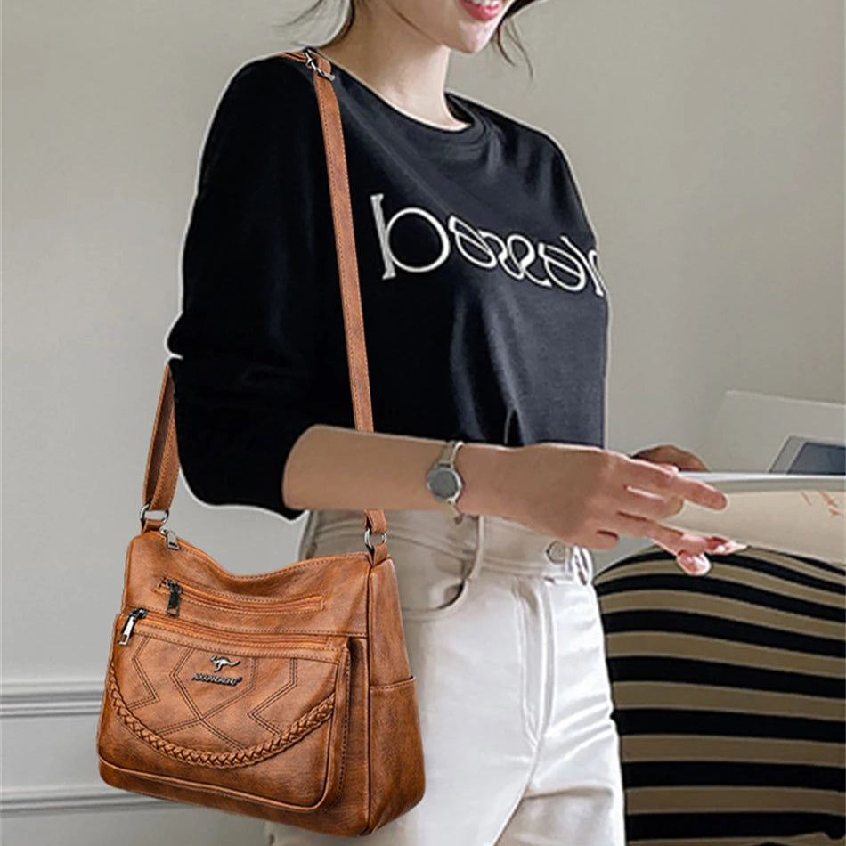 Leather shoulder bag with adjustable strap