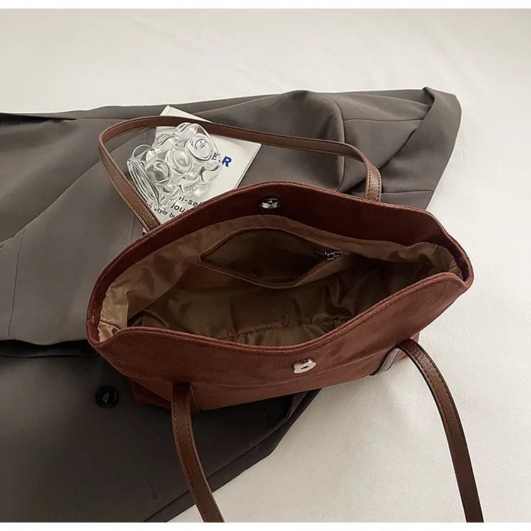 Elegant suede shoulder bag for daily wear