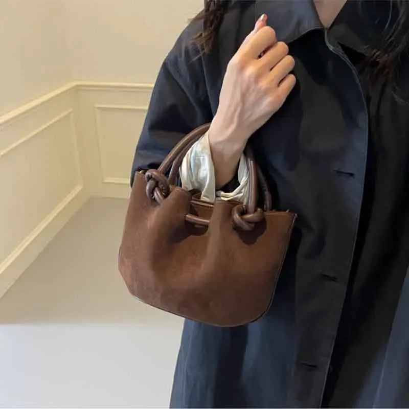 Everyday suede handbag with strap