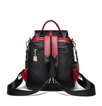Contrast-strap leather backpack