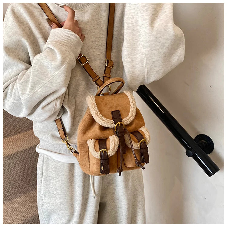 Suede backpack with front pockets