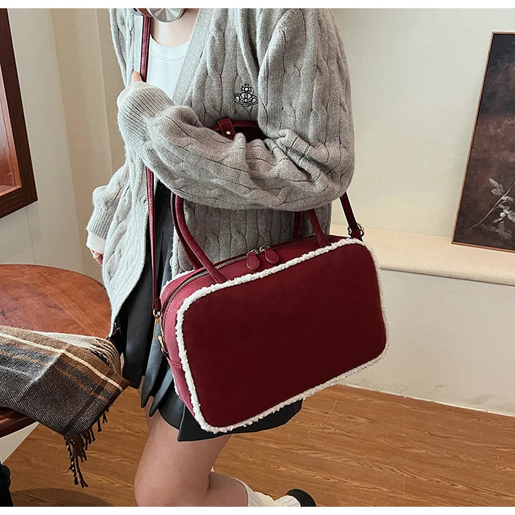 Elegant suede handbag with vintage charm