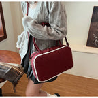Elegant suede handbag with vintage charm