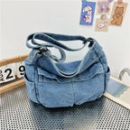 Denim top-handle handbag