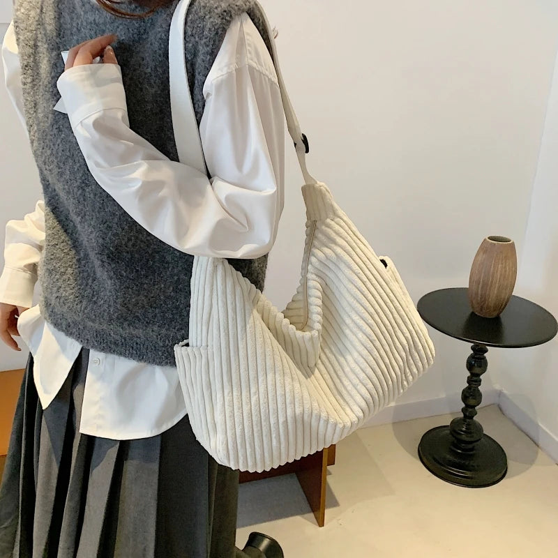 Versatile corduroy handbag with shoulder strap