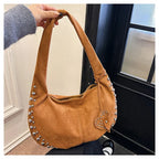 Chic suede shoulder bag with decorative strass