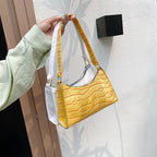 Small leather sling pouch