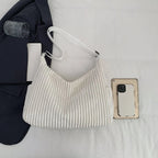 Versatile corduroy handbag with shoulder strap